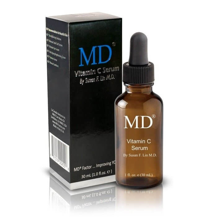 MD Ultimate Vitamin C bottle and box packaging from the MD Skin collection, featuring antioxidant serum for bright, youthful-looking skin