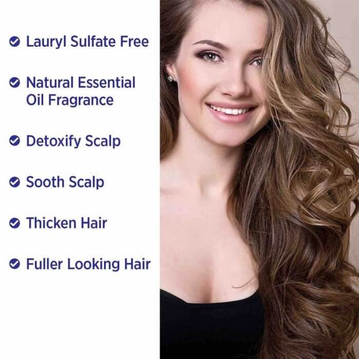 Photo of woman with long, thick, flowing hair showcasing benefits of MD® Hair Revitalizing Treatment – detoxifies scalp, thickens hair, soothes scalp, infused with natural essential oils, and lauryl sulfate free